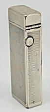 Vintage briquet Dunhill en métal argenté Suisse, breveté USA