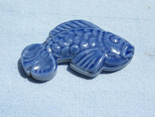 FEVE  faience ou porcelaine