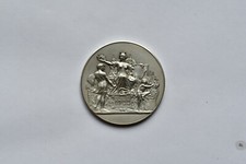 MÉDAILLE EN BRONZE ARGENTE -