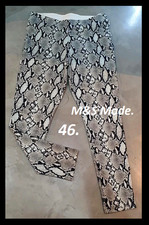 Beau pantalon chic, tissus stretch épais motifs peau de serpent T: 46