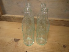 Lot 4 anciennes bouteille 25cl