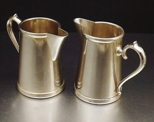 CHARLIONAIS TOULOUSE PAIRE DE VERSEUSES CEMIERS EN METAL ARGENTE VERS 1950