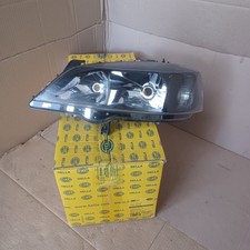 Phare gauche (fond noir) Opel