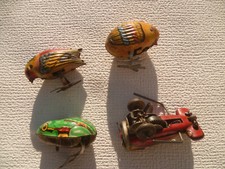 Anciens jouets tôle oiseaux