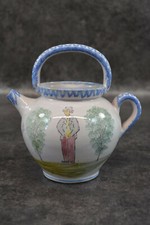 ANCIENNE CHEVERETTE EN FAIENCE