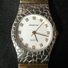Edward Lynn quartz fashion round white face watch