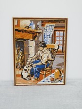 Canevas homme avec son chien encadré