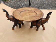 Plat en bois sculpté sur 3 éléphants 30 cm décor ethnique artisanal