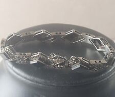 Ancien bracelet, décor onyx et marcassite, en argent massif
