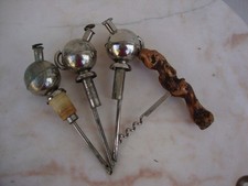 3 anciens bouchons doseurs à