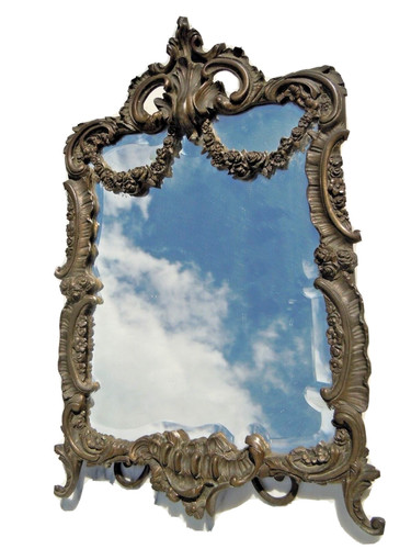 Miroir rocaille bronze cisele