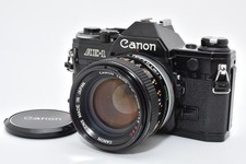 [N.Mint] Appareil photo argentique Canon AE-1 SLR 35mm noir + FD 50mm f/1.4...