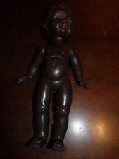 Ancienne petite poupée noire 41 cm de haut ( made in italie )