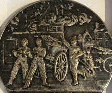 MÉDAILLE EN BRONZE ARGENTÉE