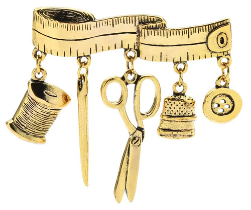 Broche mètre couturière