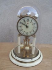 PENDULE SOUS GLOBE KOMA