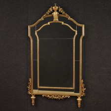 Grand miroir doré de style
