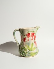 Ancien pichet en barbotine St