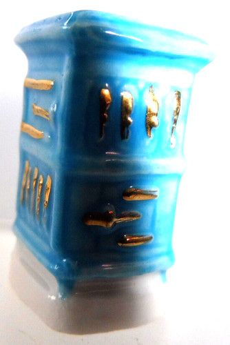Fève poële en - -, faience