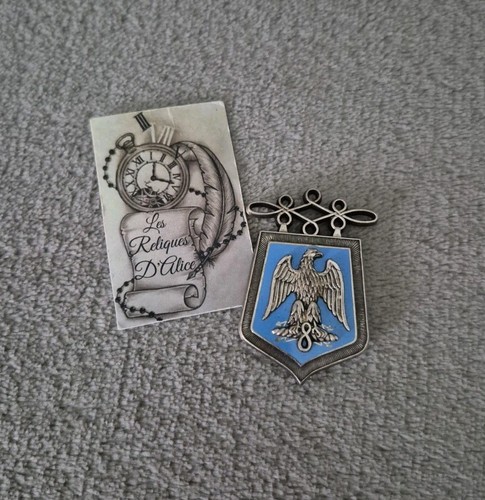Insigne pucelle 8 e - 8,