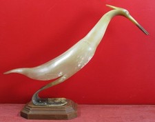 grand oiseau en corne