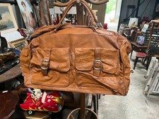 Grand sac de voyage vintage en cuir fauve à poches