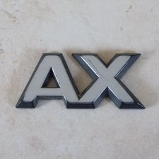 Ancien insigne emblème AX Citroen mascotte plaque badge voiture plastique