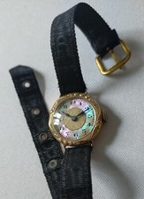 Ancienne montre mécanique pour femme, en plaqué or rose Art Déco cadran nacré 