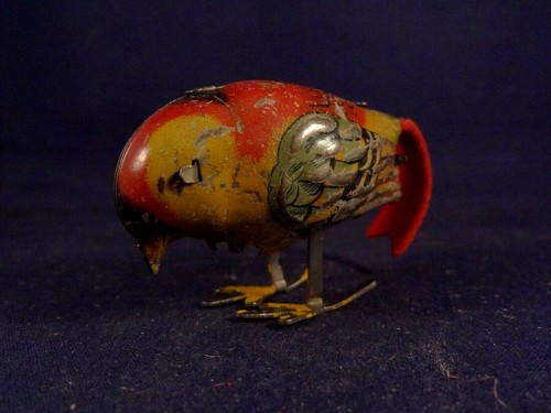 Ancien jouet mécanique tôle