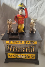 TIRELIRE MÉCANIQUE VINTAGE NOTE KYSER & REX 1882  EN DESSOUS ORGUE SINGE