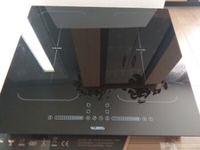  table de cuissson à induction VALBERG noire. 2 flex zone, booster et minuteur.