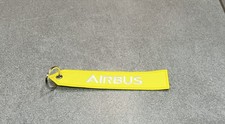 PORTE-CLES CLEF KEY KEYCHAIN JAUNE BANDEAU VALISE AVIATION AVION AIRBUS ATLANTIC