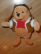 Doudou Peluche ours winnie l'ourson orange rouge manteau aviateur Disney nicotoy