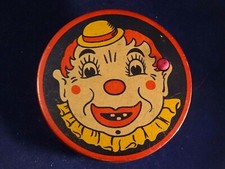 Ancien jouet musical carnaval crécelle tôle clown cirque lithographiée 40 
