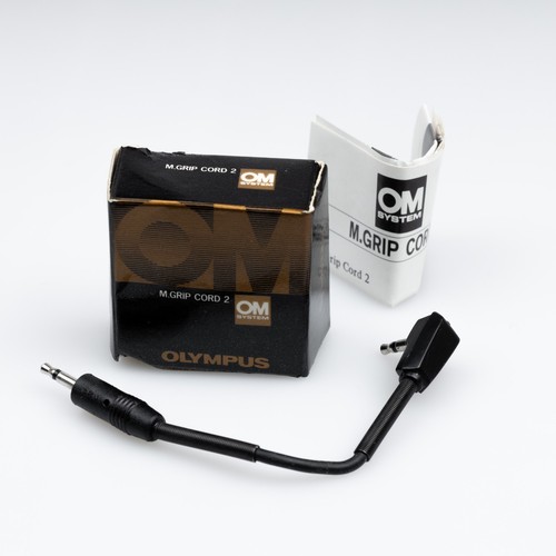 New olympus grip cord - olympus, m.grip