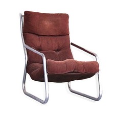 Fauteuil structure tubulaire inox et velours