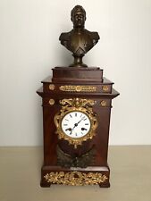 Horloge avec buste de