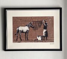 lithographie banksy avec certificat et encadrée 