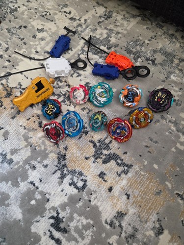Assorted beyblades with - 10,