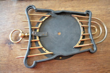 Pièce  Fond de pendule horloge métal en forme de lyre