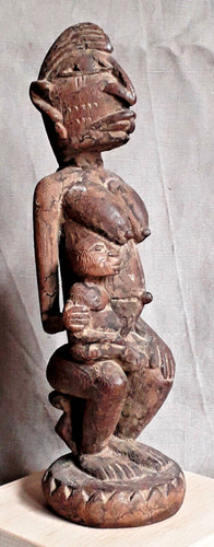 Uncommon dogon seated - uncommon,