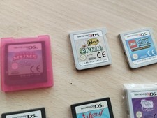 Nintendo 2DS XL Système Portable - Noir/turquoise + 13 jeux