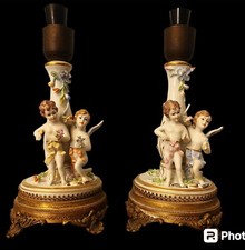 Paire de lampes en céramique avec petits anges signés carpie capodimonte