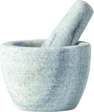 Mortier en marbre avec pilon