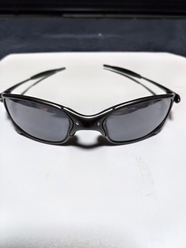 Lunettes soleil noires - de,