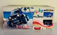 Voiture radiocommandée Nikko Tricky Pajero, wheelie, conduite à une roue.
