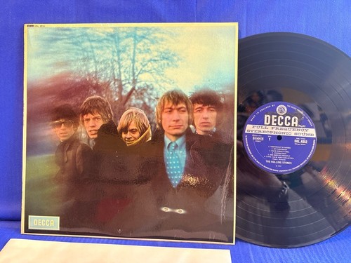 Rolling stones between buttons - between,