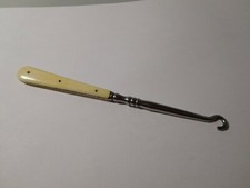 Tire lacets ancien - à voir