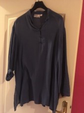 Chemise violette tissu tres souple