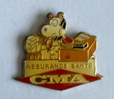 100 - Pin's BD PEANUTS - RARE SNOOPY PUBLICITE CMA ASSURANCE SANTE - TOSCA